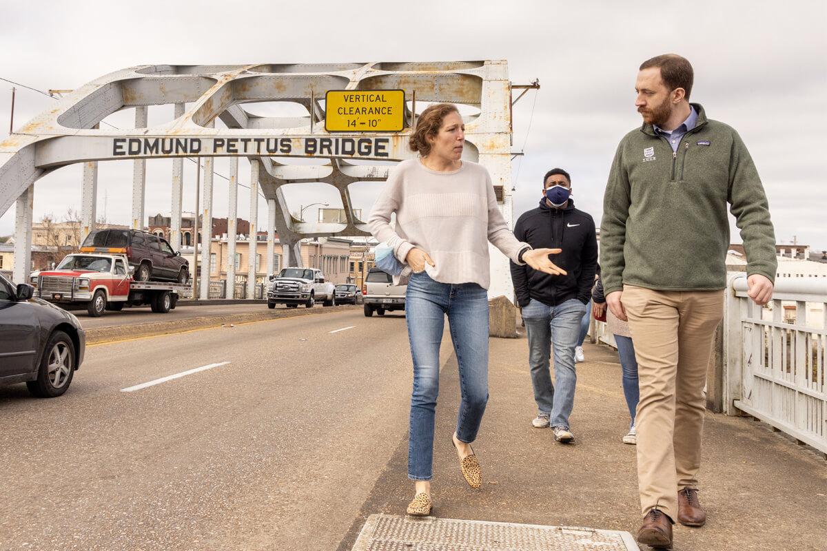 Students walking across Pettus Bridge