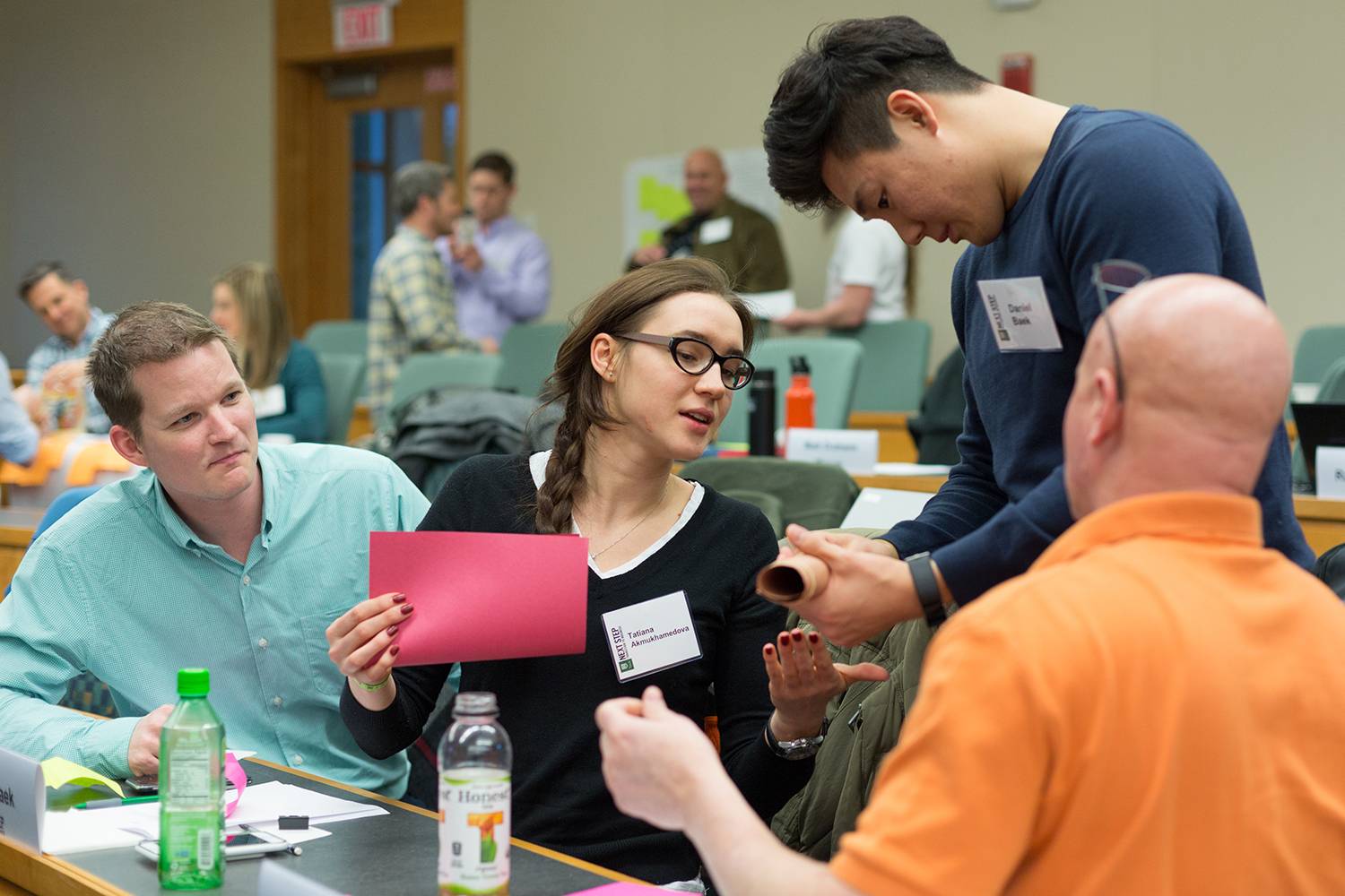 Tuck Next Step participants during group work