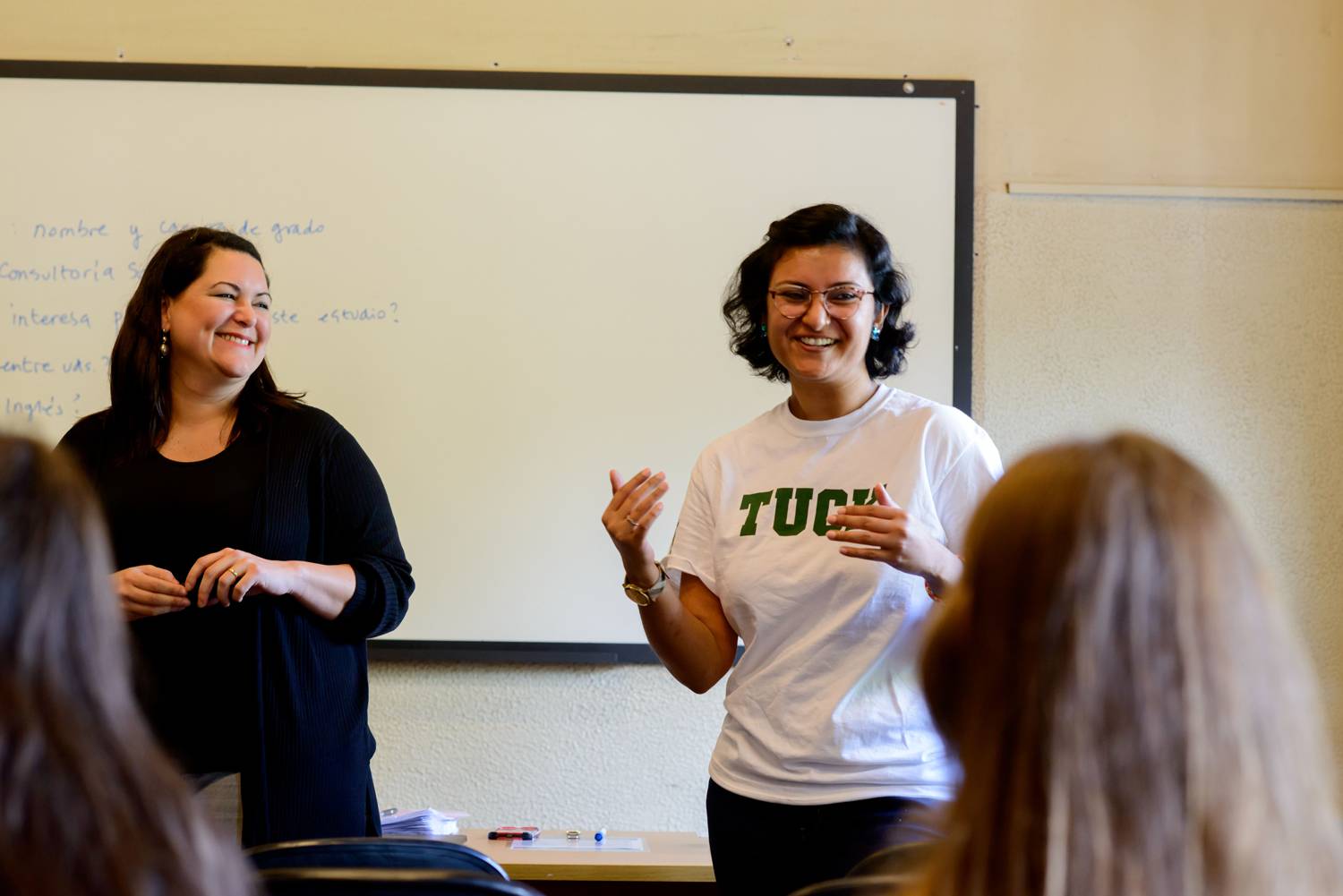 Tuck students in classroom